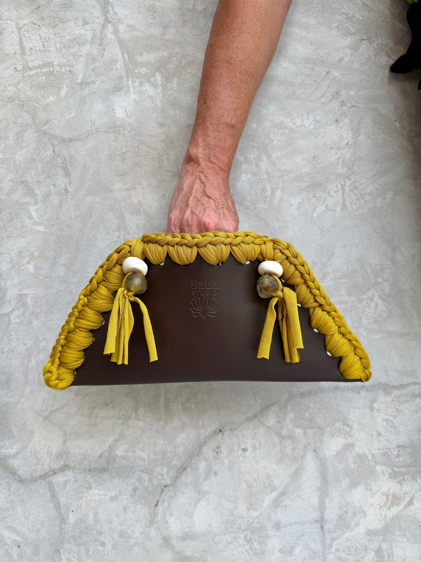 Kora clutch