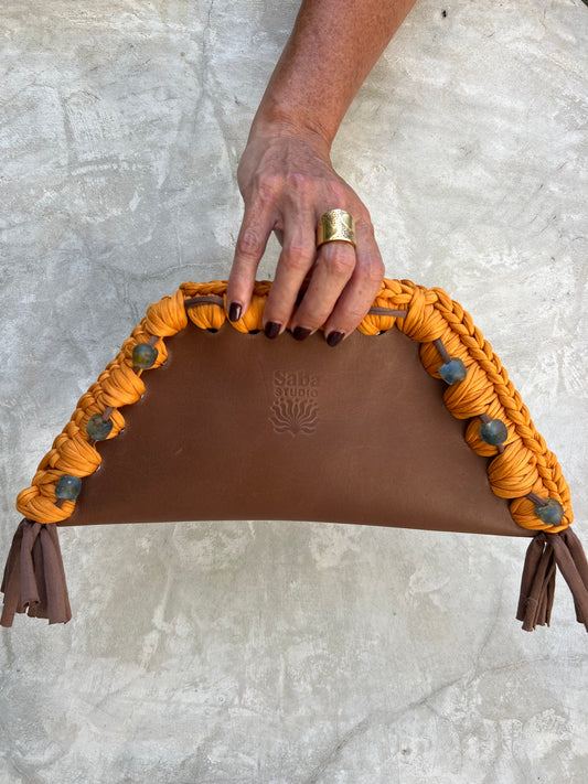 Kora clutch