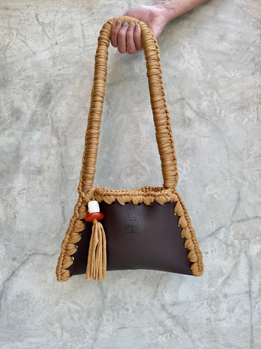 Saba Studio Solara shoulder bag in tan repurposed textile with red and white bead, full view